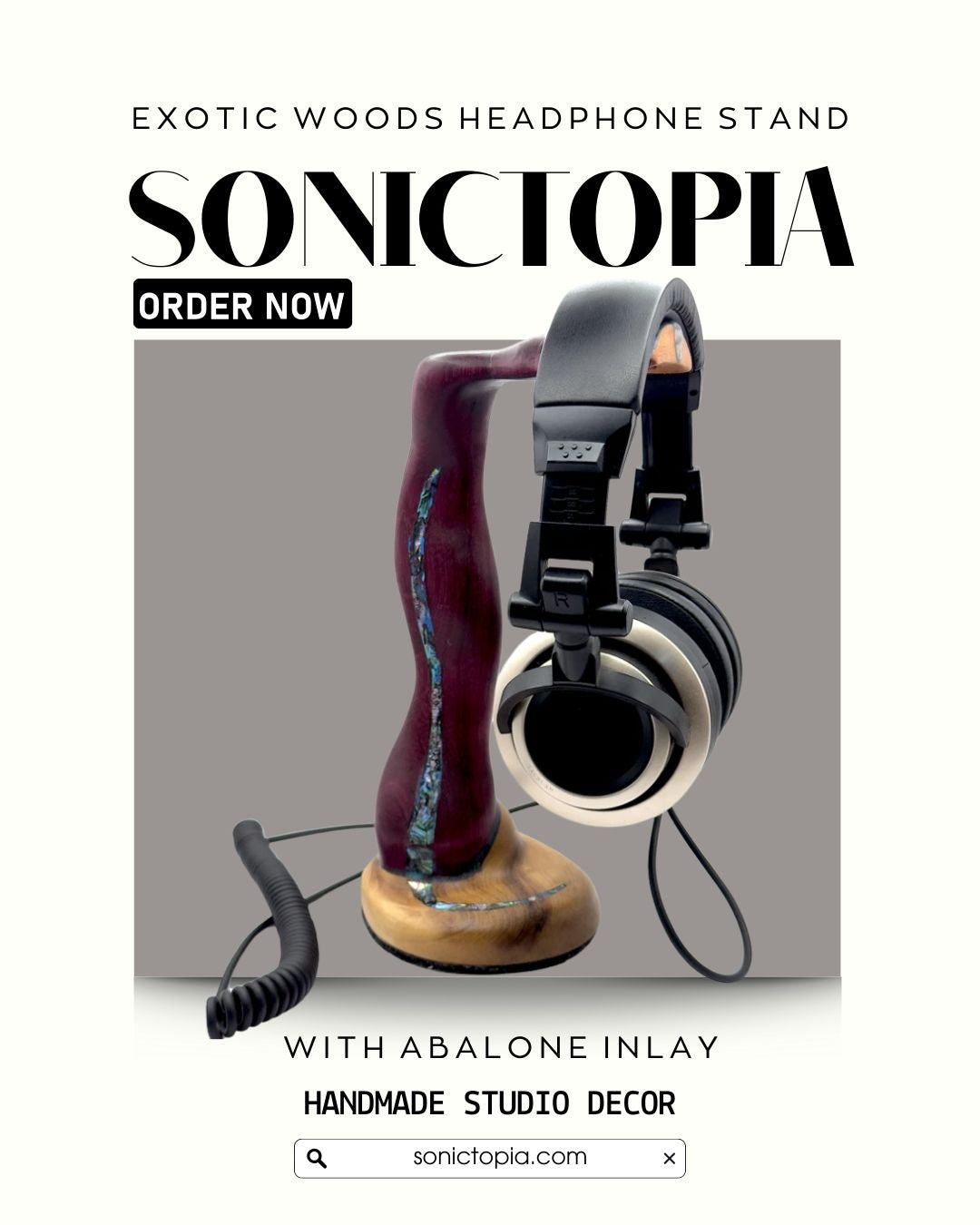 Purple heart headphone stand displaying studio headphones"