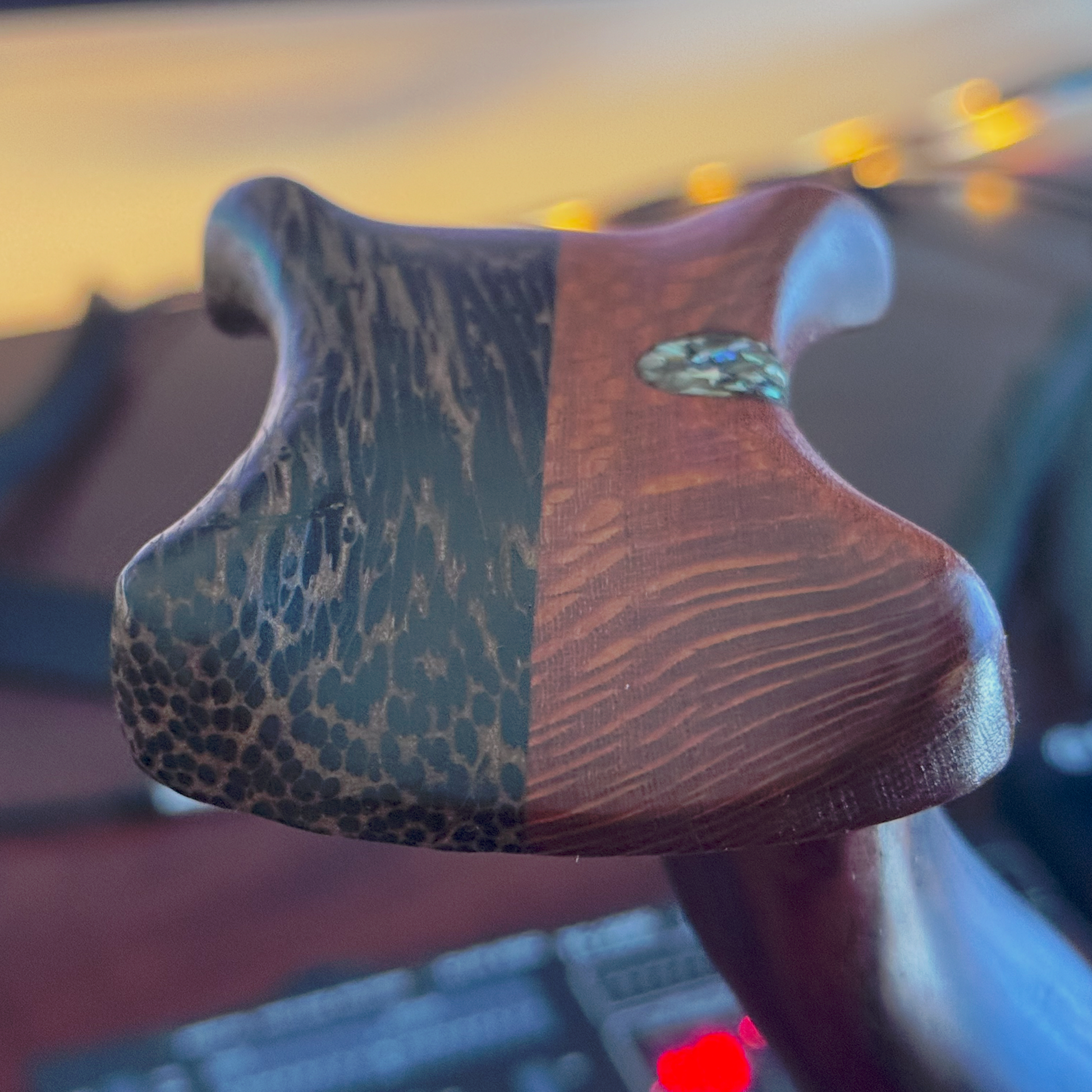 Side view of handcrafted cocobolo headphone holder"