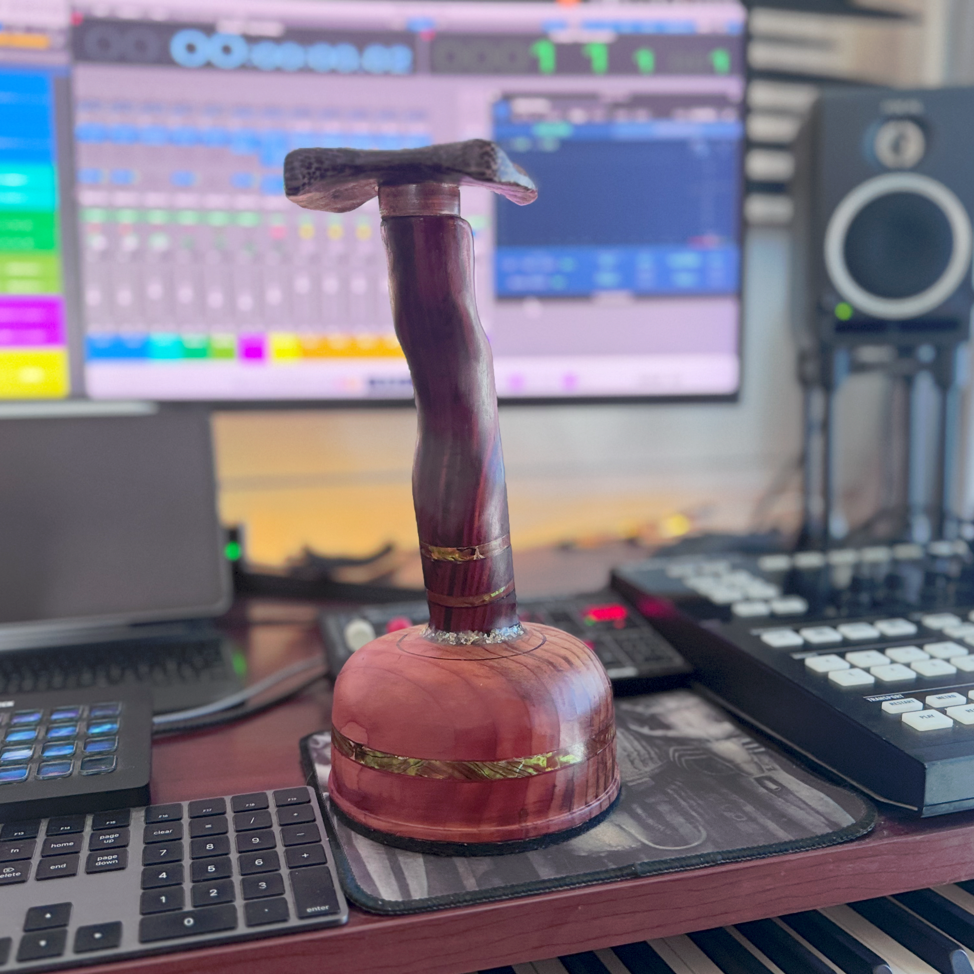 Cocobolo headphone stand in music studio setup