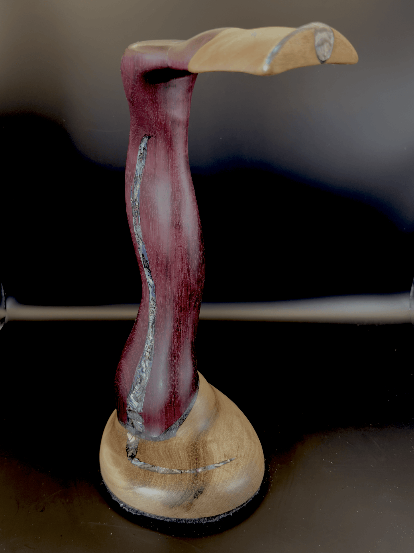 Purple heart wood color variation on headphone stand