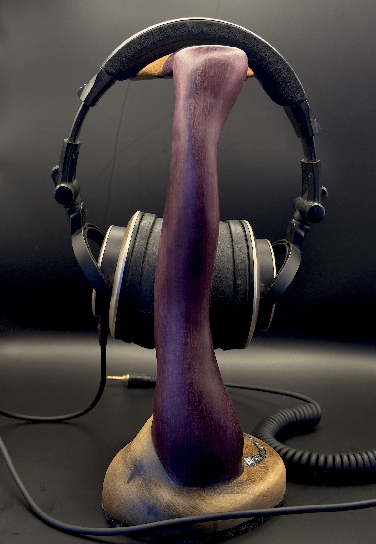 Purple heart headphone stand in audiophile setup