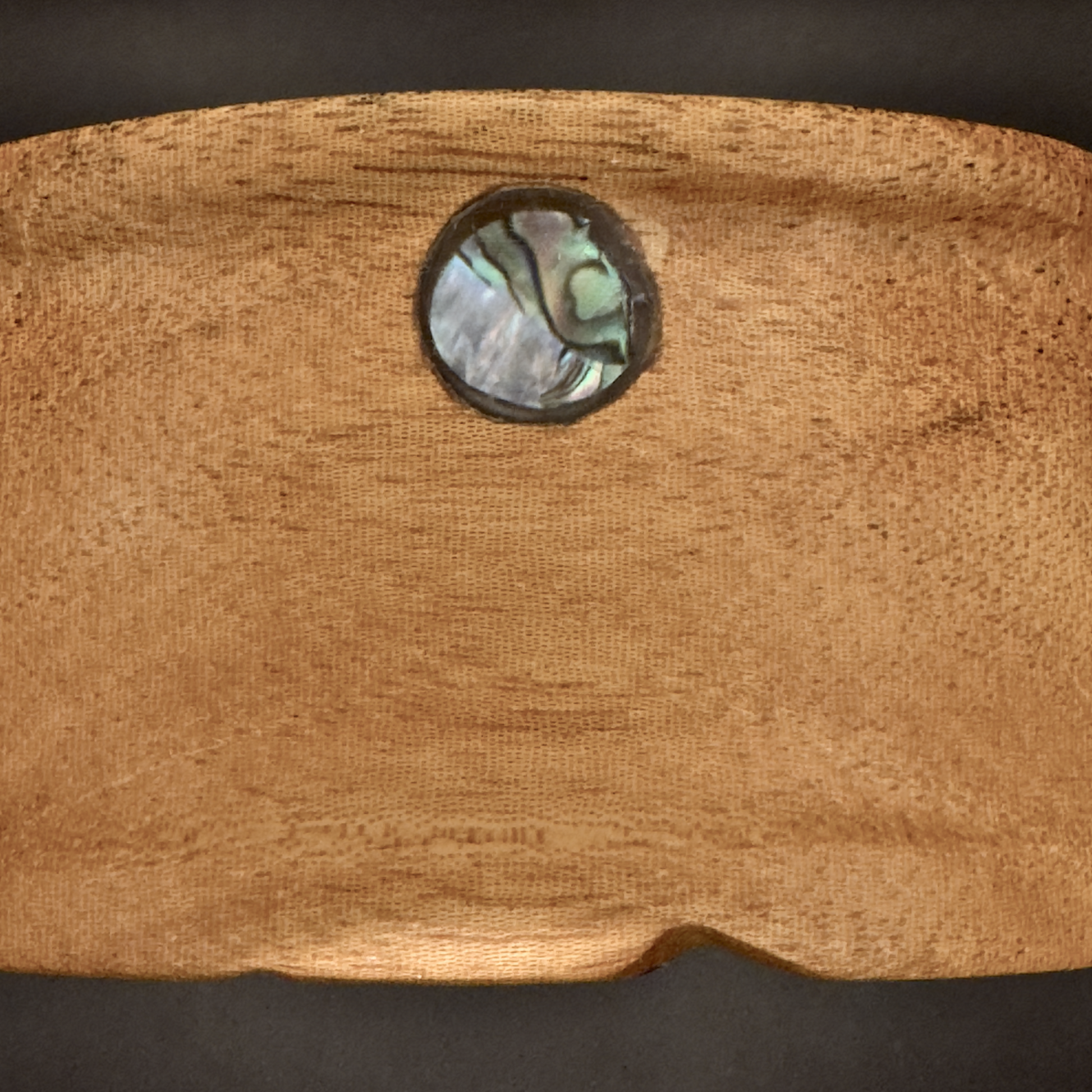 Overhead view of rosewood headphone stand