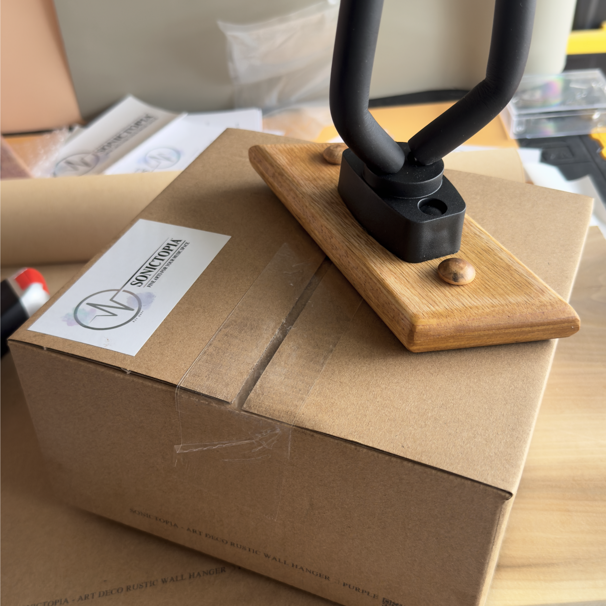 Packaging and presentation of handcrafted guitar wall hanger