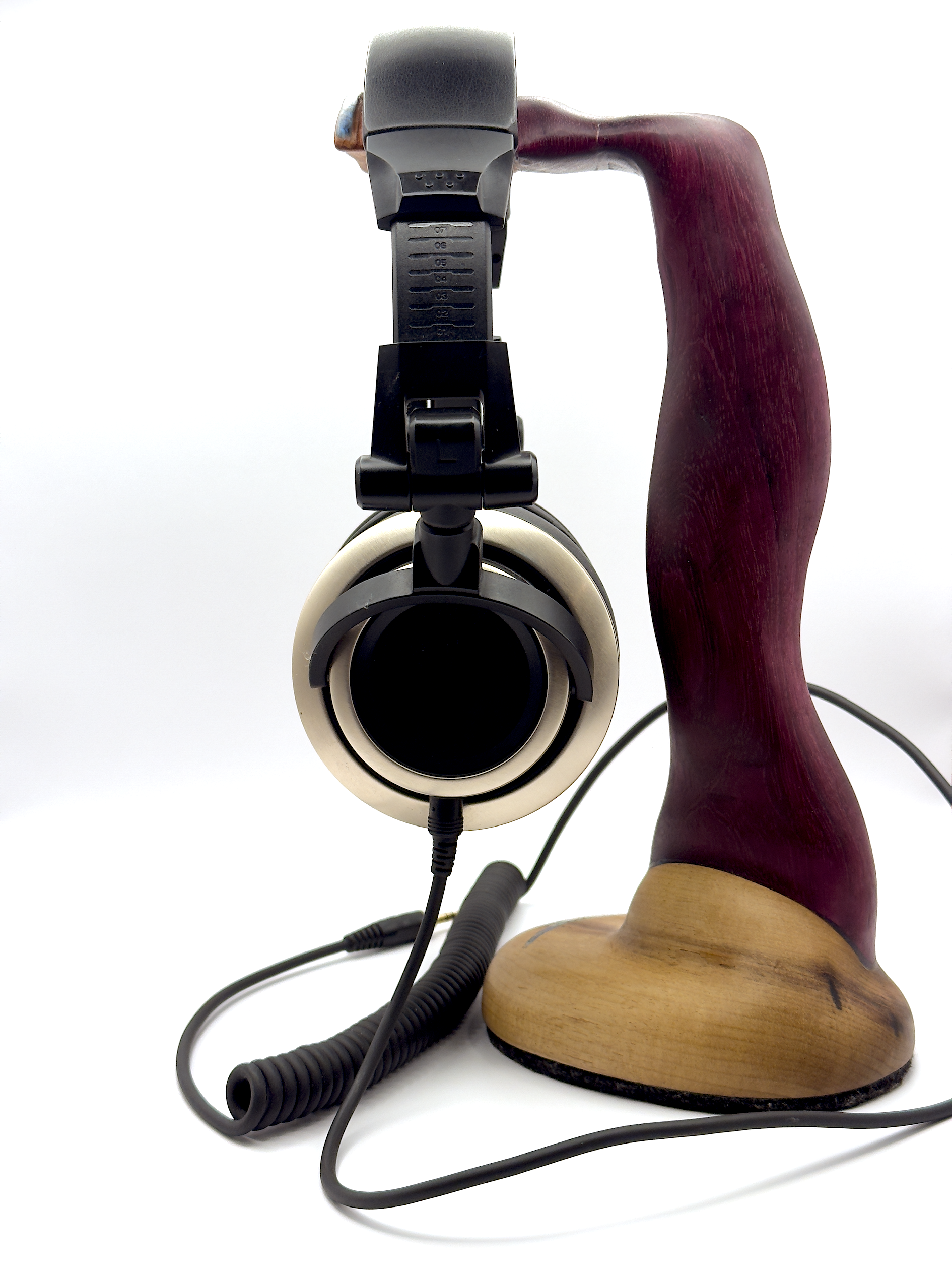 Side profile of handcrafted purple heart headphone holder