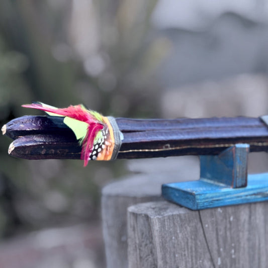Handcrafted feather decoration on Patuá shamanic rattle #007