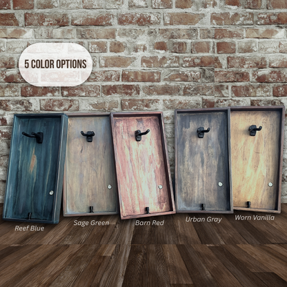 Finishes on handmade ukulele wall display frame in reef blue with LED light